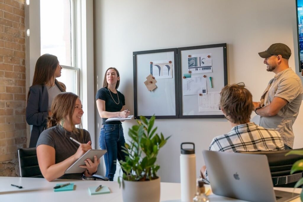 Team reviewing a system diagram on a collaboration whiteboard